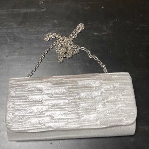 Silver clutch carried once with detachable chain